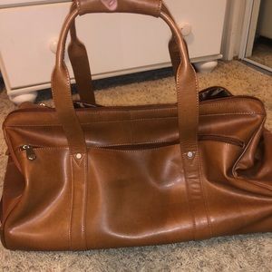 Leather rolling bag